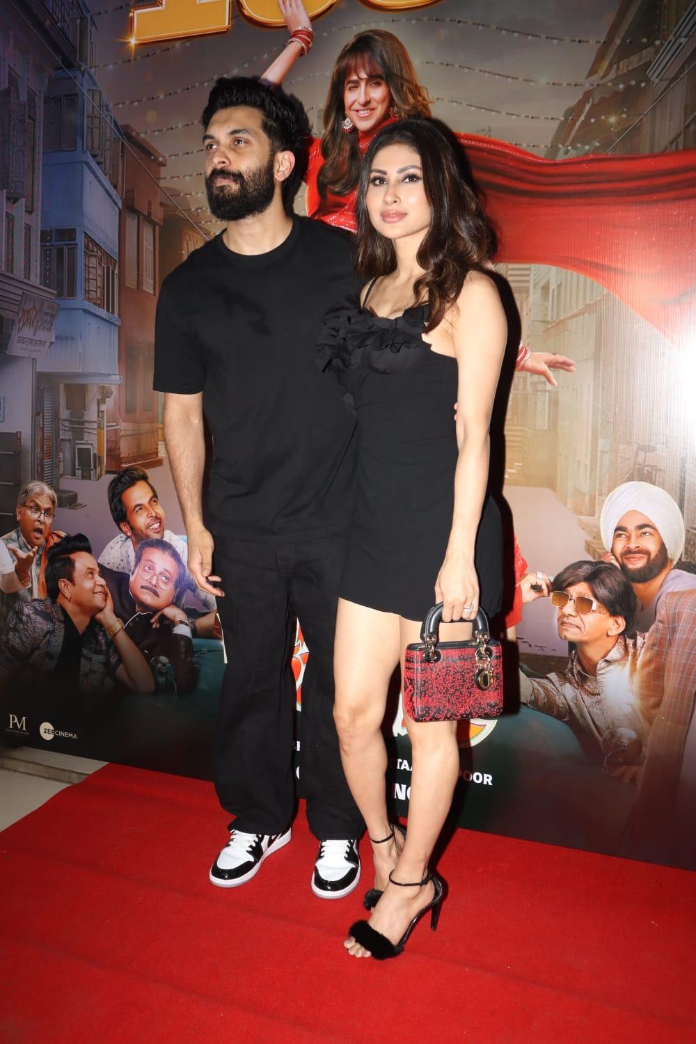 Hot couple alert! Mouni Roy with husband Suraj Nambiar at the Dream Girl 2 success bash